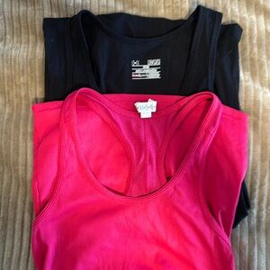 Under Armour tank tops.